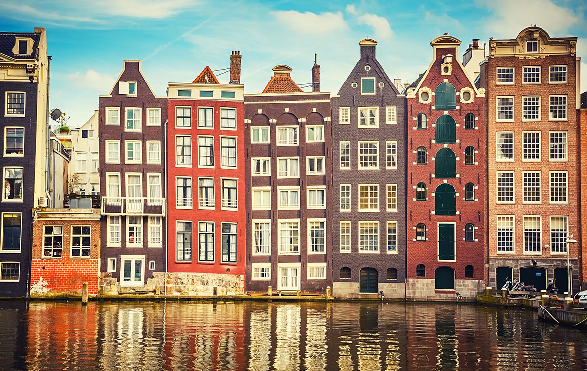 Fly business class to Amsterdam, then cruise the Prinsengracht to visit Anne Frank’s House. - IFlyFirstClass